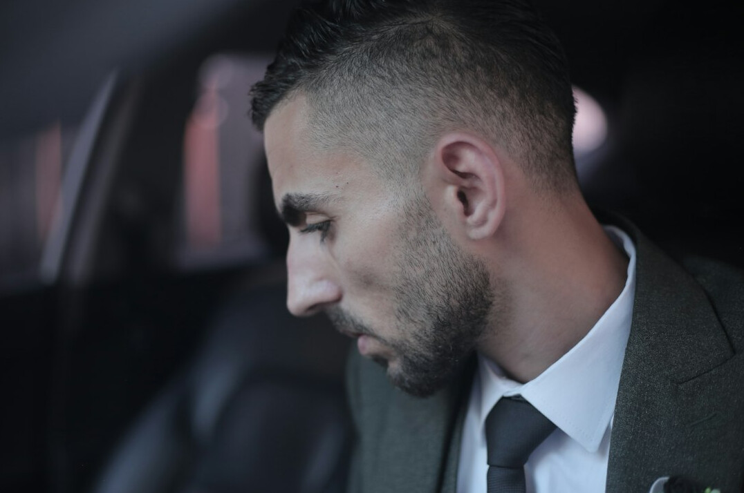 Portrait of a man in a suit with a confident look